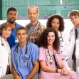 Cast members of the television series ER posing together in a hospital setting. Cast members of the television series ER posing together in a hospital setting.