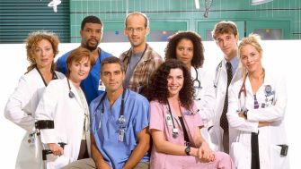 Cast members of the television series ER posing together in a hospital setting.