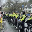 Black-led women's running group, TrailblazHers, and police during the Boston Marathon, with officers forming a barricade at Mile 21. Black-led women's running group, TrailblazHers, and police during the Boston Marathon, with officers forming a barricade at Mile 21.