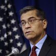Image of Xavier Becerra speaking at a podium with a microphone, in front of an American flag backdrop. Image of Xavier Becerra speaking at a podium with a microphone, in front of an American flag backdrop.