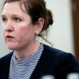 A woman speaking during a meeting, discussing issues related to consumer protection and the recent Supreme Court ruling affecting the FTC's powers. A woman speaking during a meeting, discussing issues related to consumer protection and the recent Supreme Court ruling affecting the FTC's powers.