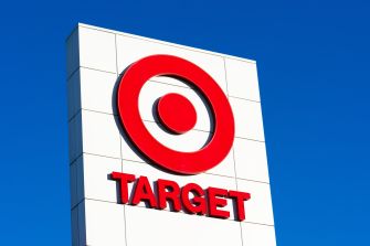 Target store sign against a clear blue sky.
