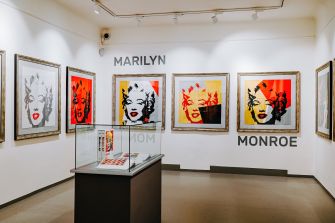Art gallery showcasing Andy Warhol's iconic portraits of Marilyn Monroe.