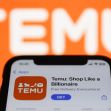 Image of a smartphone displaying the Temu app with the slogan "Shop Like a Billionaire" against an orange background. Image of a smartphone displaying the Temu app with the slogan "Shop Like a Billionaire" against an orange background.