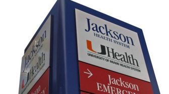 Signage for the Jackson Health System, affiliated with the University of Miami Health System.