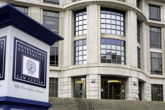 Georgetown University Law Center building exterior with signage.
