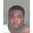 Mugshot of a man facing charges related to disruptive behavior on a flight. Mugshot of a man facing charges related to disruptive behavior on a flight.