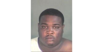 Mugshot of a man facing charges related to disruptive behavior on a flight.