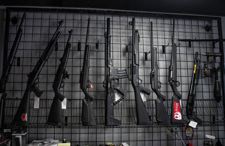 Rifles and shotguns on display at a gun shop in Fresno County on July 12, 2022. (Larry Valenzuela, CalMatters/CatchLight Local)