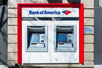 Bank of America ATM exterior with cash and deposit options.