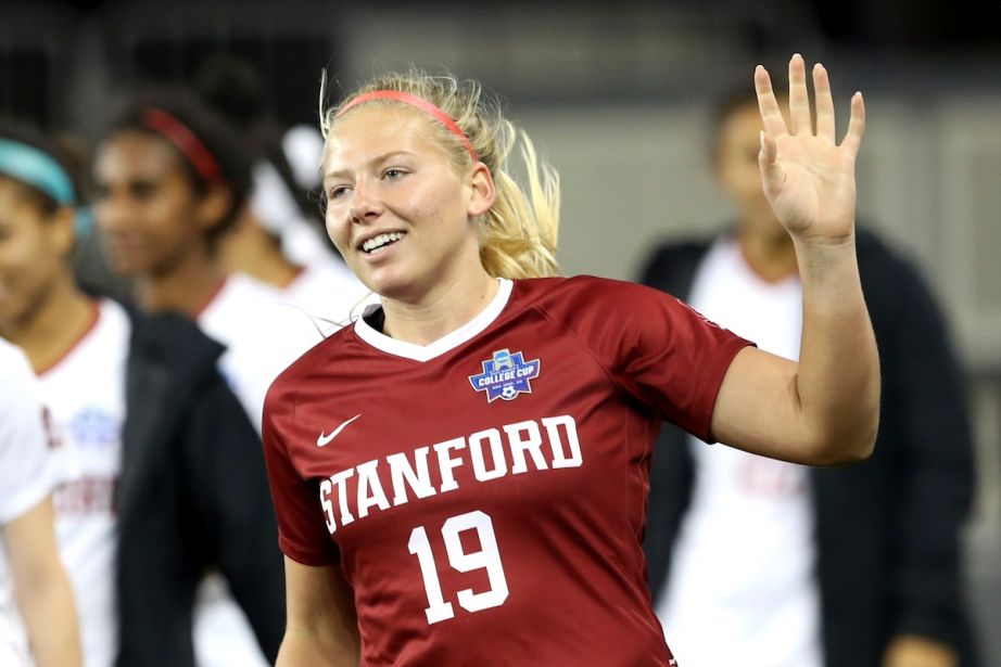 Stanford goalkeeper Katie Meyer acknowledges the crowd after a national semifinal win against UCLA on Dec. 6, 2019. Meyer's parents have filed a wrongful-death lawsuit against Stanford, saying the 22-year-old goalie was distressed over facing discipline over an incident from August 2021. (Ray Chavez/Bay Area News Group/AP)