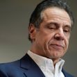 Former Governor Andrew Cuomo looking down, appearing contemplative, during a press event. Former Governor Andrew Cuomo looking down, appearing contemplative, during a press event.