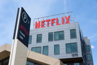 Netflix office building exterior with a sign indicating guest valet parking.
