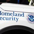 U.S. Department of Homeland Security logo on a vehicle. U.S. Department of Homeland Security logo on a vehicle.