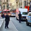 Emergency responders at the scene of the Manhattan parking garage collapse, with police and fire vehicles present. Emergency responders at the scene of the Manhattan parking garage collapse, with police and fire vehicles present.