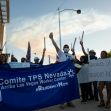 A rally supporting Temporary Protected Status (TPS) with demonstrators holding signs and a banner in Las Vegas. A rally supporting Temporary Protected Status (TPS) with demonstrators holding signs and a banner in Las Vegas.