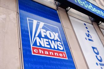 Logo of Fox News Channel displayed on a building.
