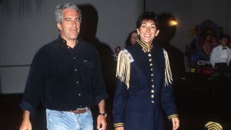 Ghislaine Maxwell and Jeffrey Epstein at an event, both appearing in casual clothing.