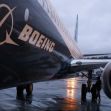 Boeing 737 Max aircraft parked at an airport with the Boeing logo visible on the side. Boeing 737 Max aircraft parked at an airport with the Boeing logo visible on the side.