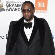 Sean Combs, also known as Diddy, attending a Grammy Awards event in formal attire. Sean Combs, also known as Diddy, attending a Grammy Awards event in formal attire.