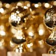 Golden Globes trophies displayed in a row, reflecting light. Golden Globes trophies displayed in a row, reflecting light.