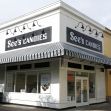 Image of a See's Candies store front, featuring the business's signage and an awning. Image of a See's Candies store front, featuring the business's signage and an awning.