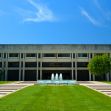 Kansas Supreme Court building with a fountain and green lawn. Kansas Supreme Court building with a fountain and green lawn.