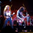 Led Zeppelin performing on stage, featuring lead vocalist Robert Plant and guitarist Jimmy Page. Led Zeppelin performing on stage, featuring lead vocalist Robert Plant and guitarist Jimmy Page.