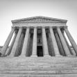 The U.S. Supreme Court building with its iconic columns and steps. The U.S. Supreme Court building with its iconic columns and steps.