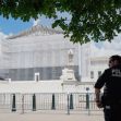 A police officer stands guard outside the U.S. Supreme Court building, which is covered in scaffolding. A police officer stands guard outside the U.S. Supreme Court building, which is covered in scaffolding.