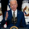 President Biden speaking at a podium with the presidential seal, addressing issues related to racism and xenophobia against Asian Americans, with flags in the background. President Biden speaking at a podium with the presidential seal, addressing issues related to racism and xenophobia against Asian Americans, with flags in the background.
