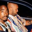 Tupac Shakur and Marion "Suge" Knight in a car, shortly before the rapper's 1996 drive-by shooting. Tupac Shakur and Marion "Suge" Knight in a car, shortly before the rapper's 1996 drive-by shooting.