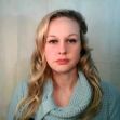 Rebekah Jones speaking during an online video, wearing a blue sweater against a neutral background. Rebekah Jones speaking during an online video, wearing a blue sweater against a neutral background.