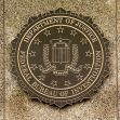 Seal of the Federal Bureau of Investigation (FBI) displayed on a textured backdrop. Seal of the Federal Bureau of Investigation (FBI) displayed on a textured backdrop.