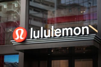Lululemon storefront with the company logo prominently displayed.