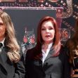 Priscilla Presley and her granddaughters, Riley Keough and a sibling, attend an event, dressed in formal black attire. Priscilla Presley and her granddaughters, Riley Keough and a sibling, attend an event, dressed in formal black attire.