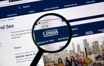 A close-up of a computer screen displaying the United States Census Bureau website with the title "Census" visible.