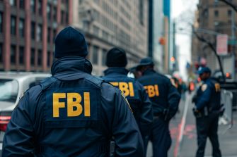 FBI agents in tactical gear standing in an urban setting.
