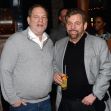 Image of Harvey Weinstein and James Dolan at an event, both in casual attire, standing together with drinks. Image of Harvey Weinstein and James Dolan at an event, both in casual attire, standing together with drinks.