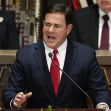 Arizona Governor Doug Ducey speaking at a public event. Arizona Governor Doug Ducey speaking at a public event.