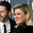 Kelly Clarkson and Brandon Blackstock at an event before finalizing their divorce. Kelly Clarkson and Brandon Blackstock at an event before finalizing their divorce.