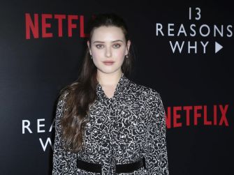 Image of a person at a promotional event for "13 Reasons Why" by Netflix.