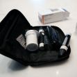 A kit containing insulin supplies, including vials and pens, on a surface with a box labeled 'Insulin Aspart'. A kit containing insulin supplies, including vials and pens, on a surface with a box labeled 'Insulin Aspart'.