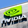 Nvidia logo displayed on the exterior of a building against a blue sky. Nvidia logo displayed on the exterior of a building against a blue sky.