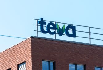 Signage for Teva Pharmaceuticals on a building exterior.