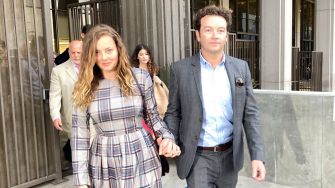 Danny Masterson and his wife, Bijou Phillips, leaving the courthouse following his sentencing for rape allegations.