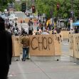 Cement and wood barricades bear the name CHOP June 16, 2020, inside what has been named the Capitol Hill Occupied Protest zone in Seattle.  (AP Photo/Ted S. Warren / AP Newsroom via Fox Business)