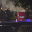 Police investigate a ballot drop box with smoke rising from it, following a reported fire incident. Police investigate a ballot drop box with smoke rising from it, following a reported fire incident.