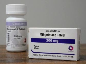 Bottles of mifepristone and misoprostol tablets used in medical abortion.