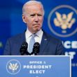 Joe Biden speaking at a podium labeled "Office of President Elect" with a serious expression. Joe Biden speaking at a podium labeled "Office of President Elect" with a serious expression.